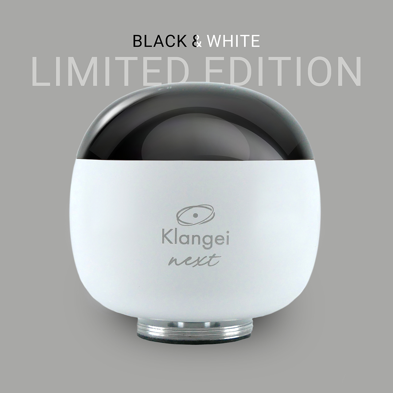 Limited edition advertisement for Klangei Next: white rounded device with a black dome top on a gray background. Text reads 'BLACK & WHITE LIMITED EDITION' above the device.